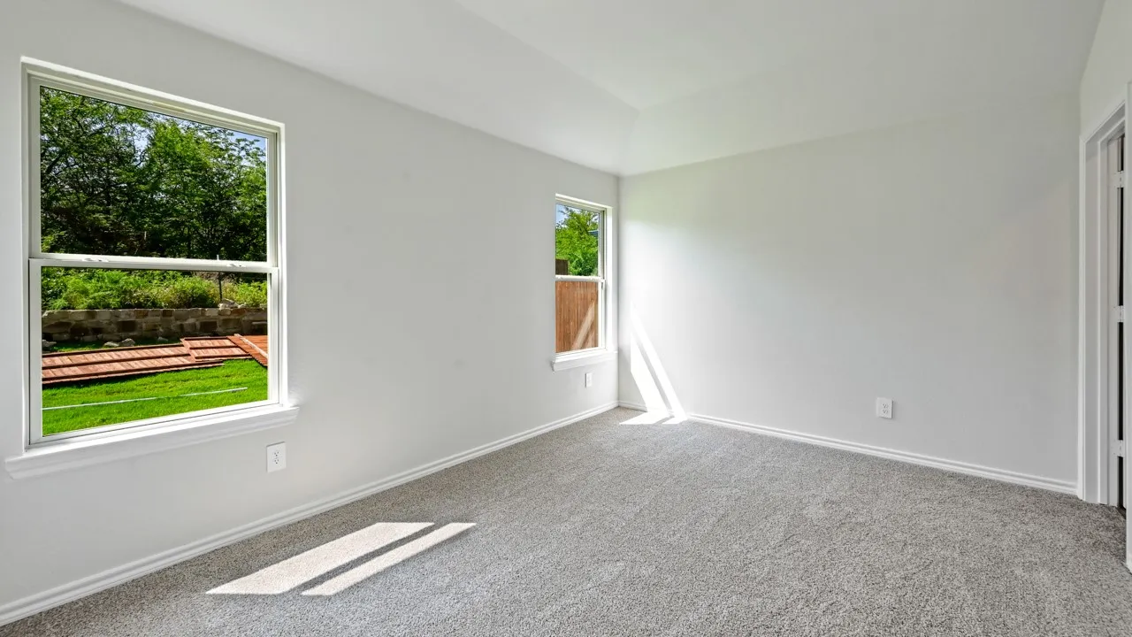 Neutral gray carpeting paired with light-toned walls