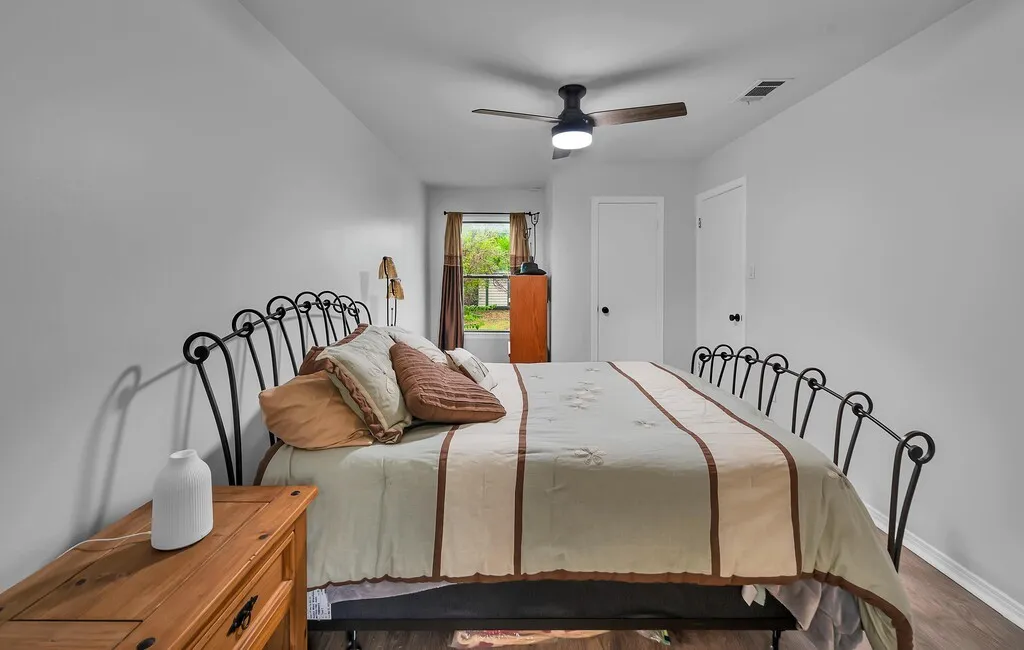 Wood-finish flooring with light gray walls
