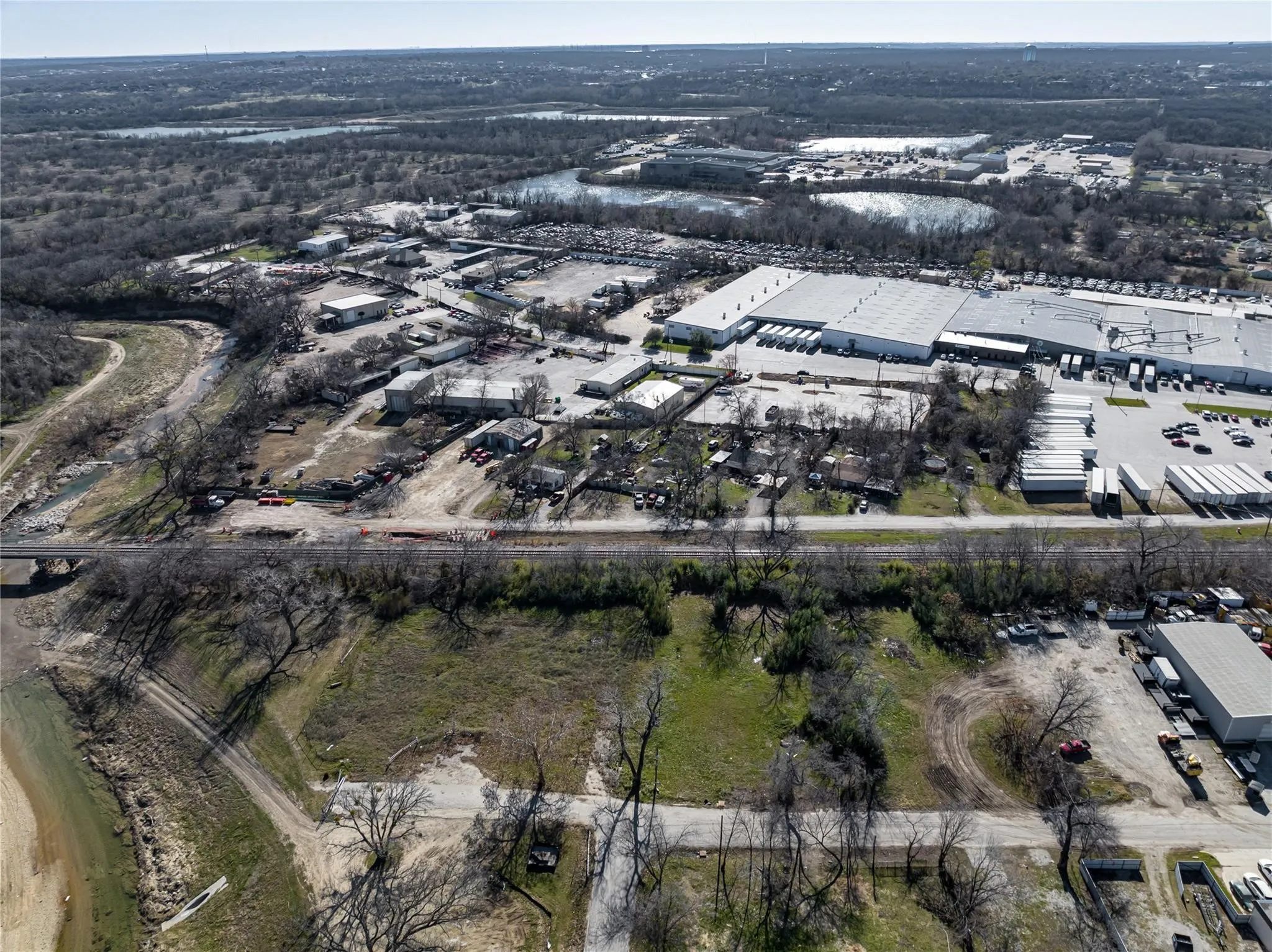 Aerial overview of property's location with industrial structures