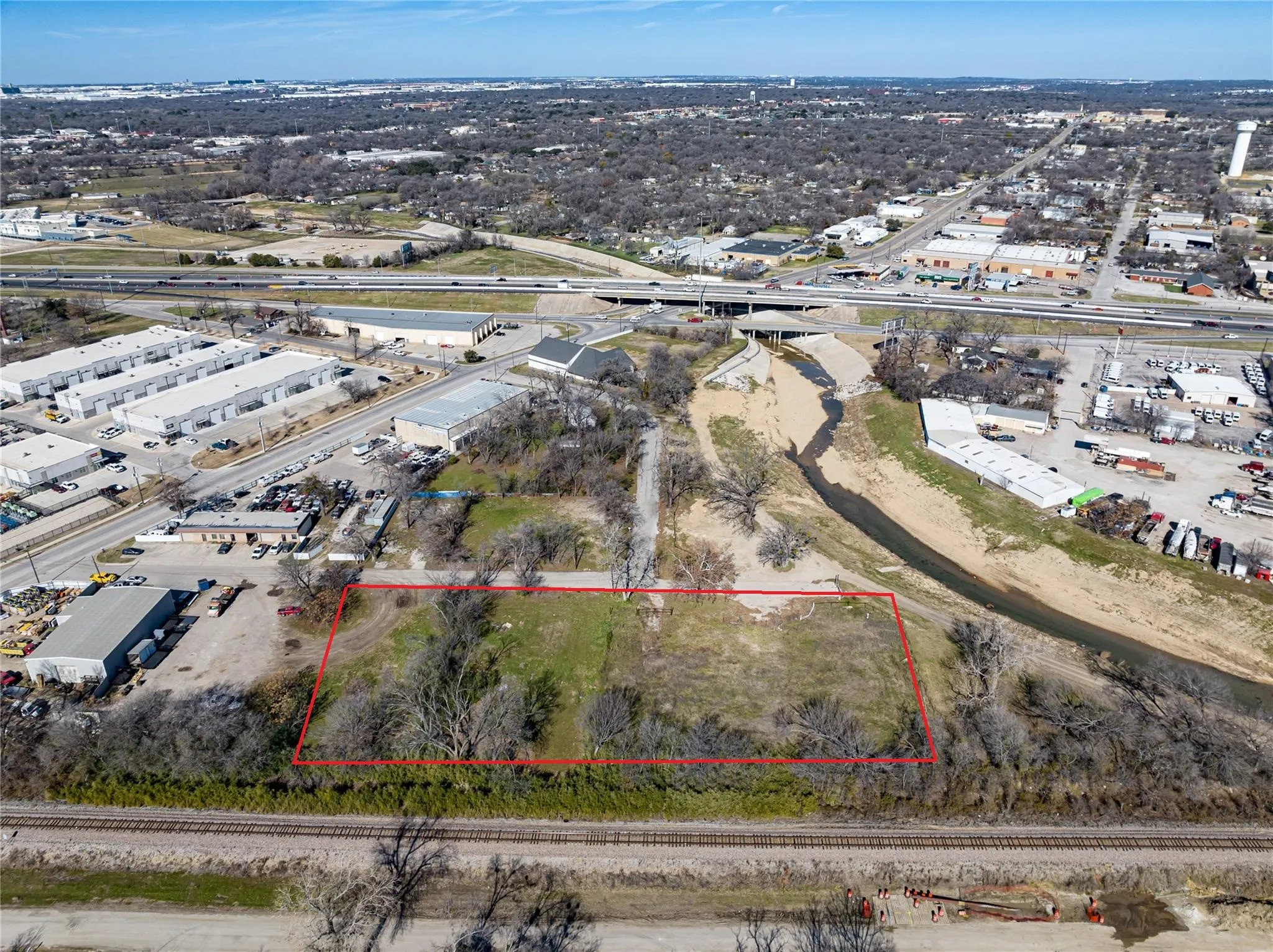 Aerial view of property's location with property parcel outlined