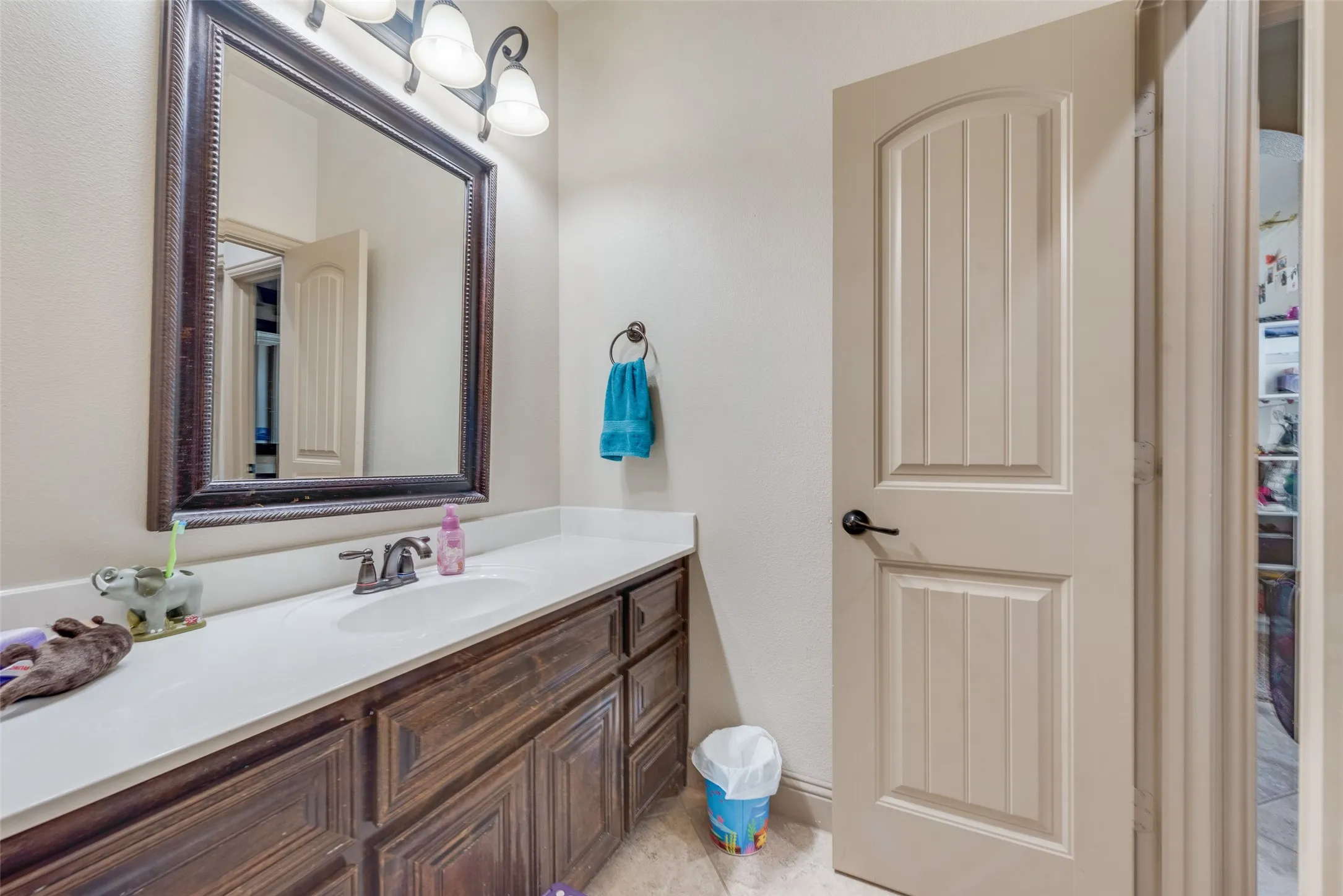 Bathroom #5 Jack and Jill Bathroom with vanity and tile patterned floors
