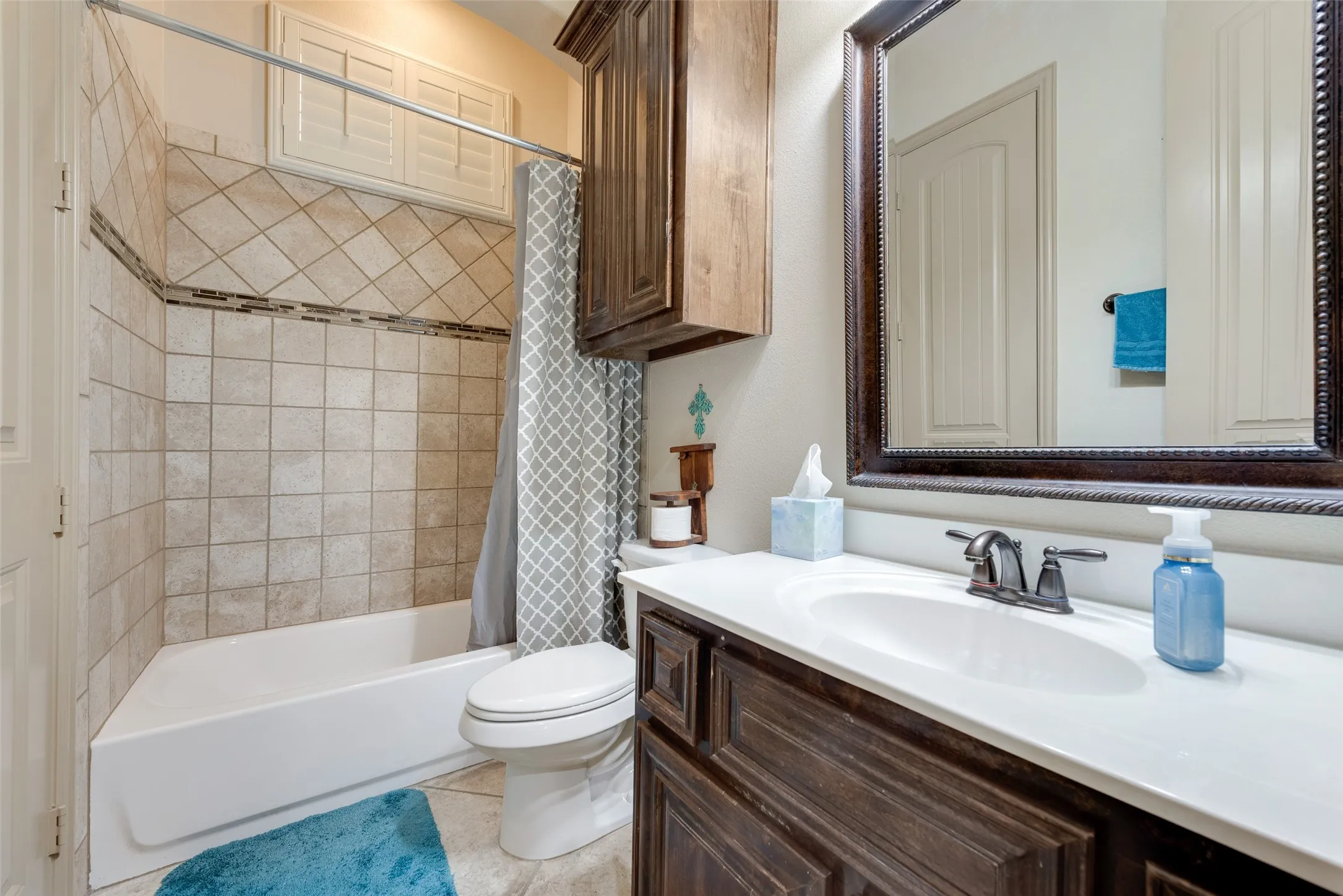 Full bathroom built in cabinets and  shower /bath combo