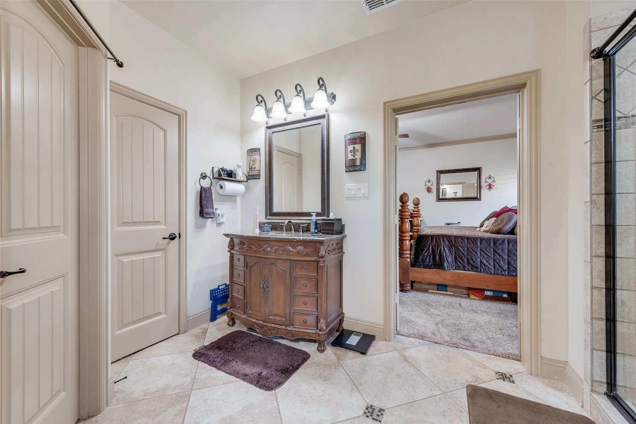 Main Primary Bathroom with separate toilet area and large walk in closet
