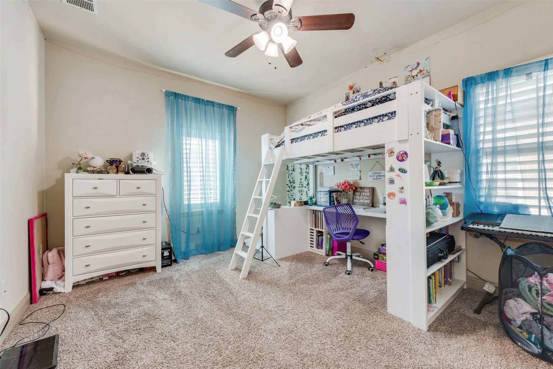 Bedroom #4 with carpet and ceiling fan