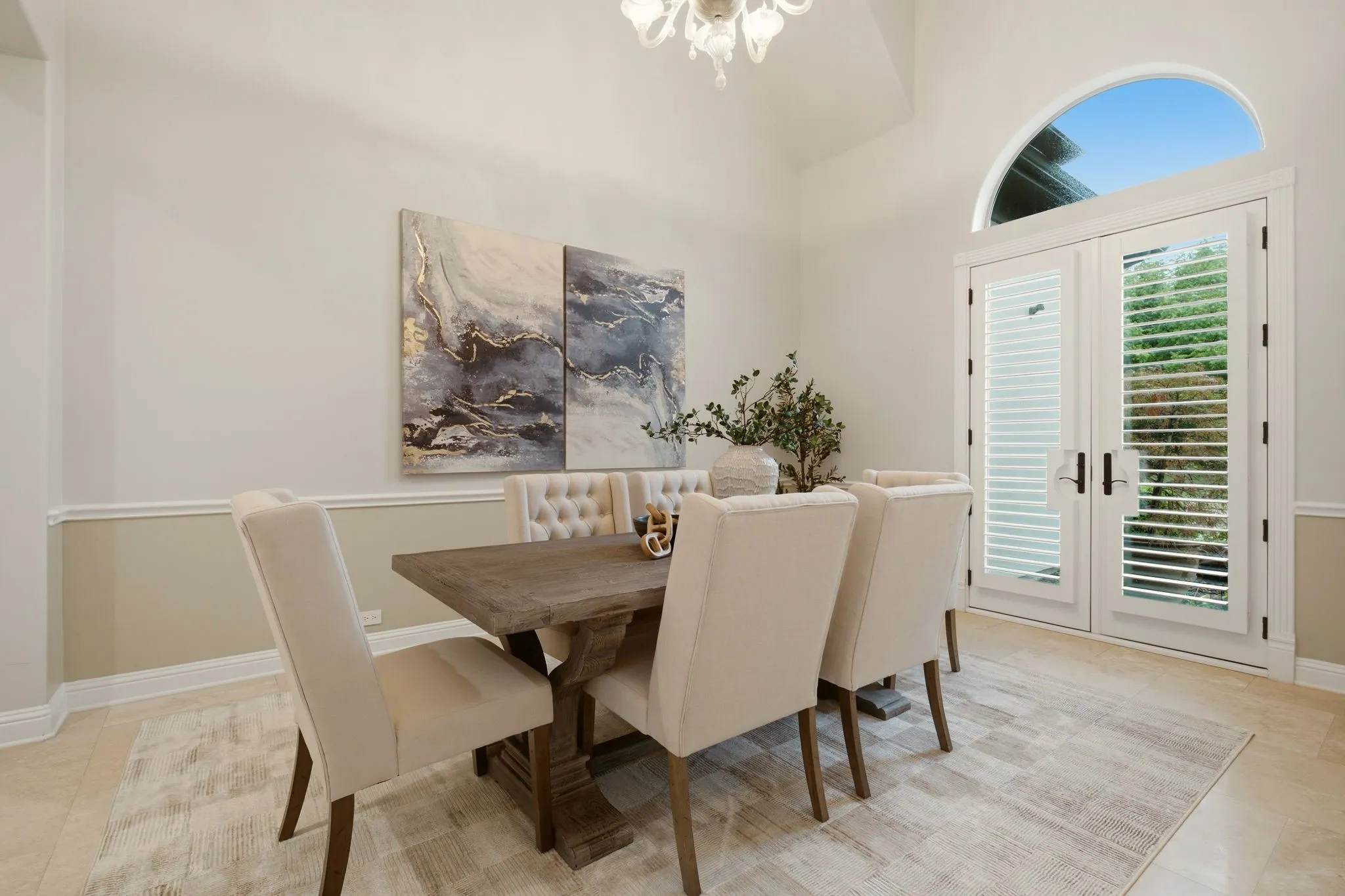 Understated elegance for holiday gatherings with family & friends. French doors open directly to the front gardens.