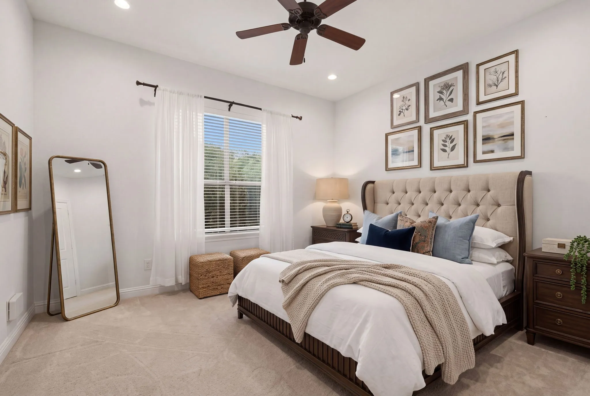 Bedroom 2 faces the back of the home, adjacent full bath to the left. Plush carpet & walk-in closets in each of the secondary bedrooms.