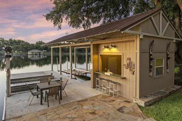 Steel framed boat dock with boathouse bar!