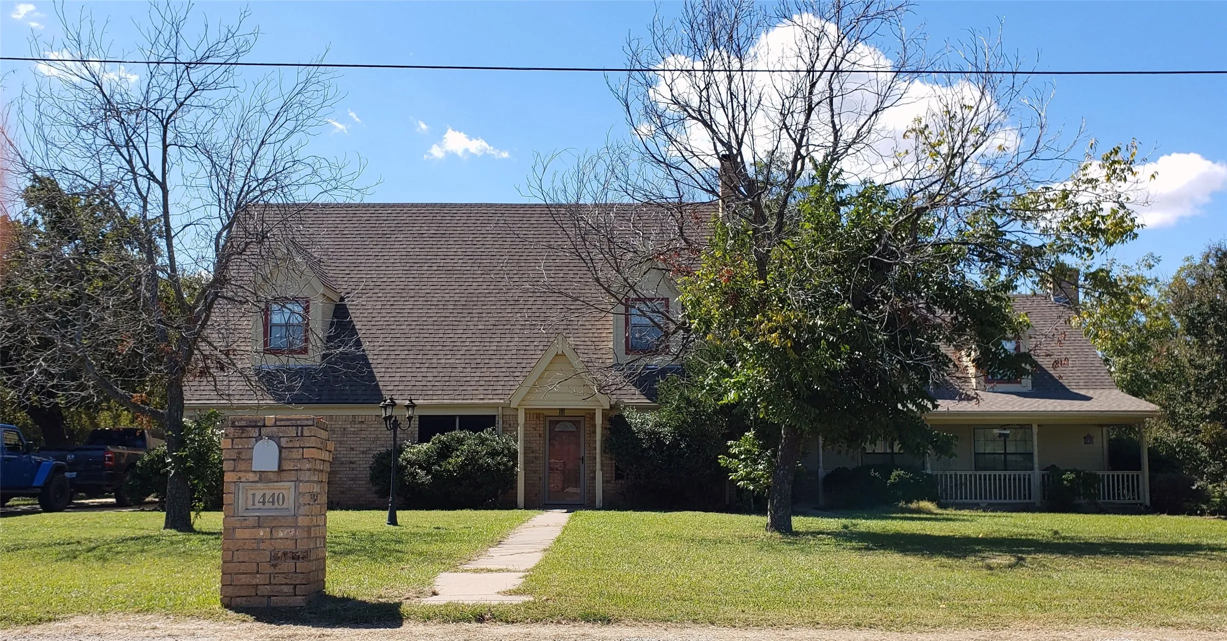 Brick and siding exterior with gabled roof lines