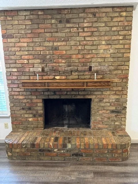 Floor To Ceiling Brick Fireplace