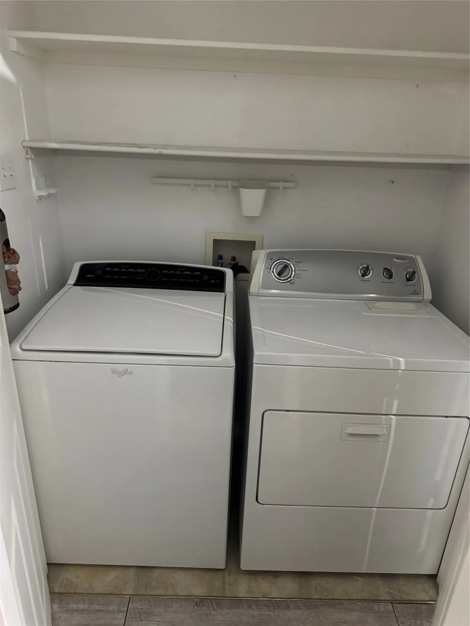 washer and dryer in laundry closet