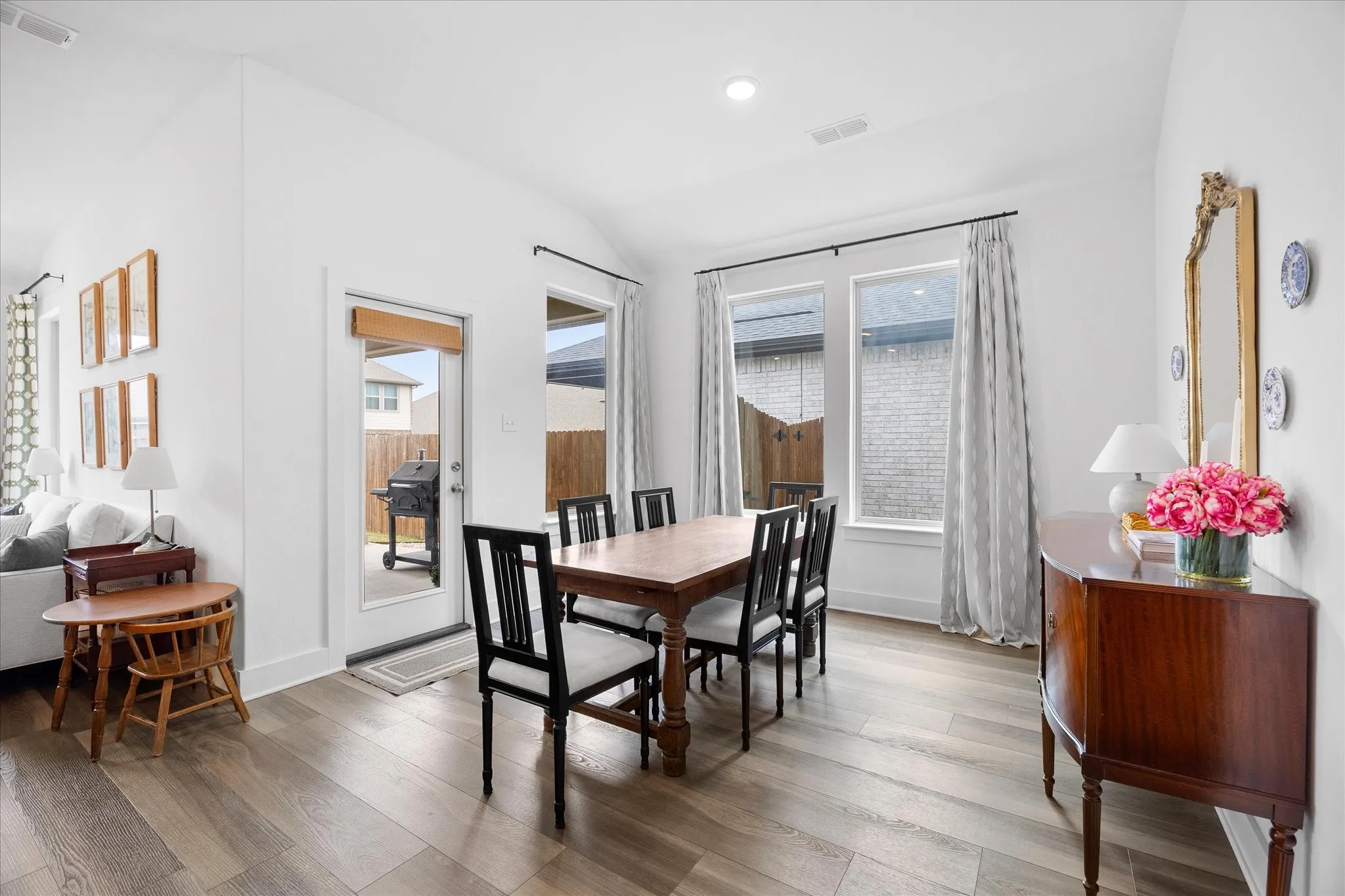 Dining area with large windows for light to fill the room