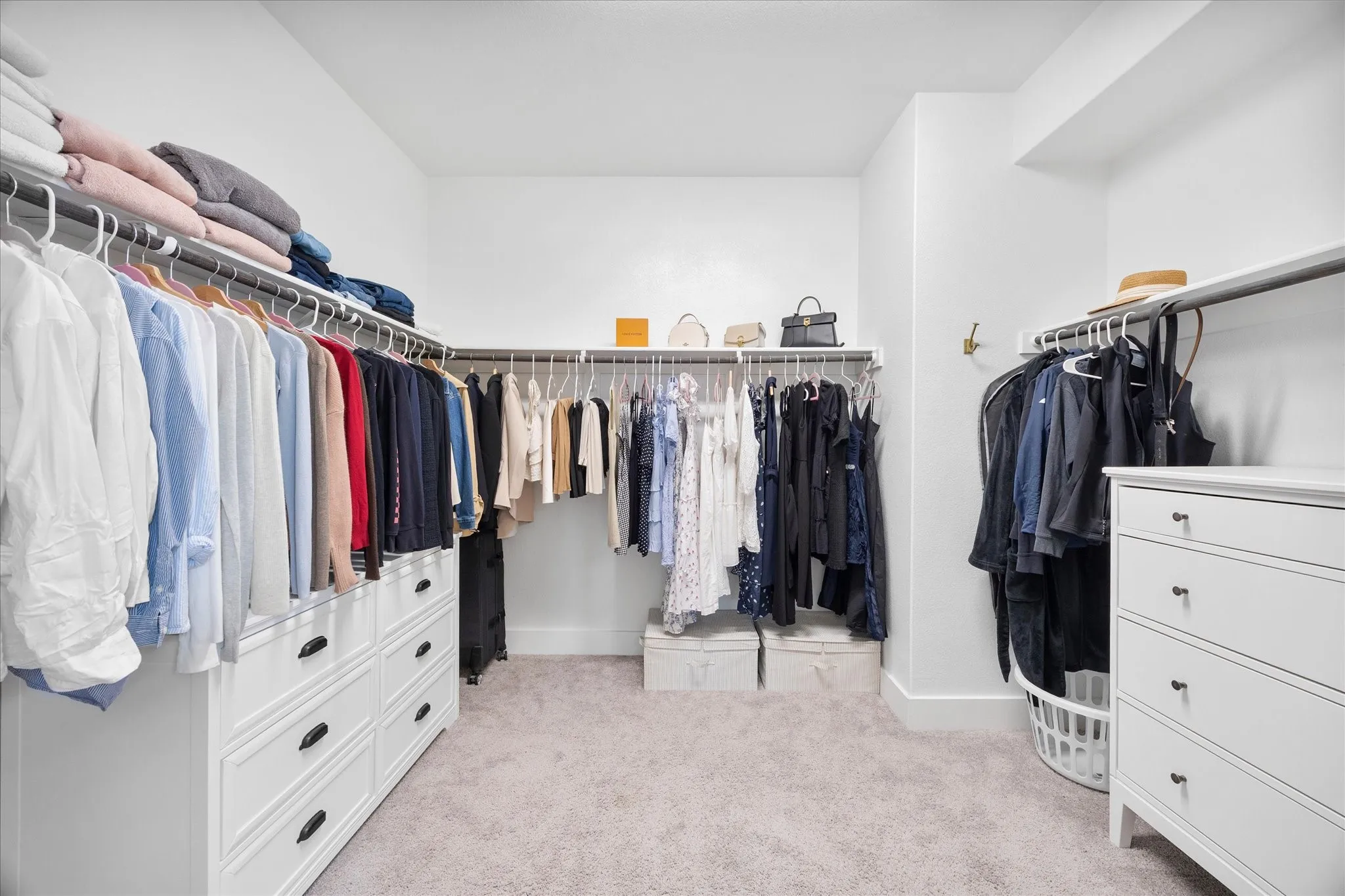 large walk in closet off the primary bathroom