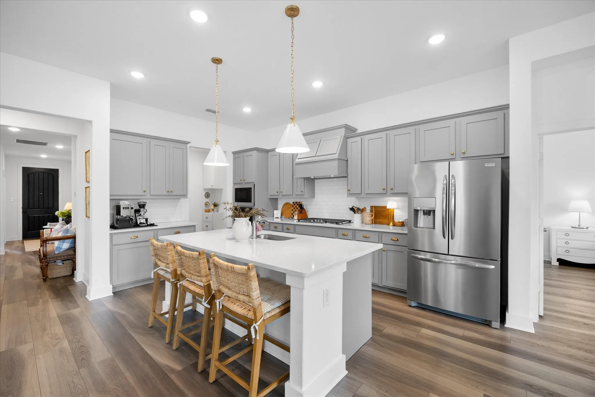 Open concept kitchen with stainless steel appliances