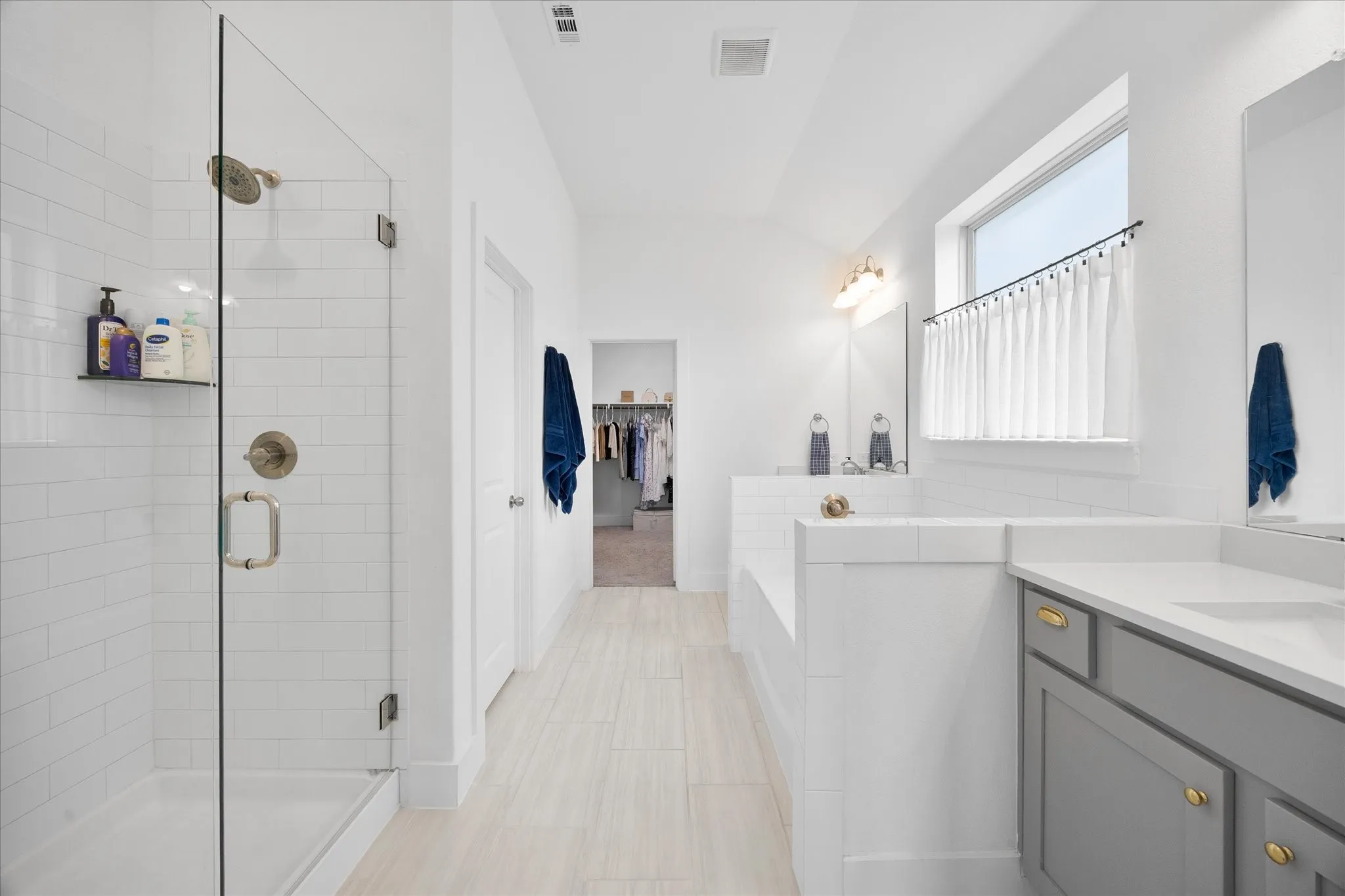 Dual vanities and separate show in primary bathrooom