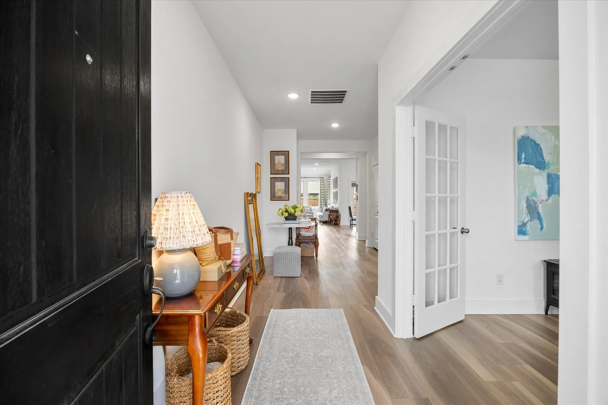Inviting foyer and office on your right at entry