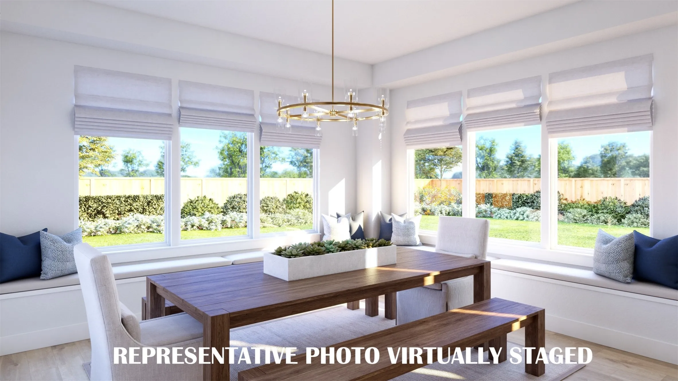 With windows everywhere you look, this dream dining room is the perfect place to host grand dinner parties or cozy family gatherings.  REPRESENTATIVE PHOTO VIRTUALLY STAGED