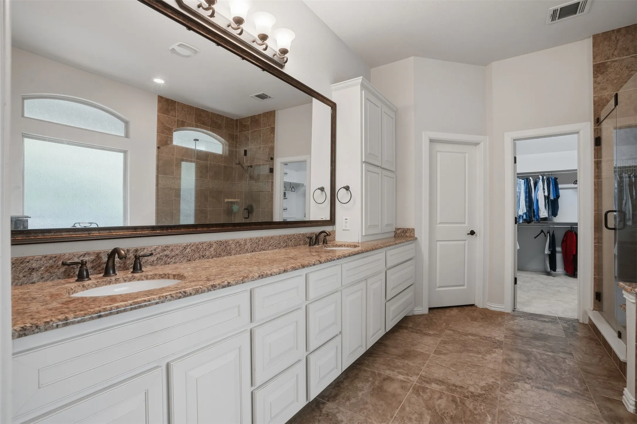 Primary bath with dual vanities