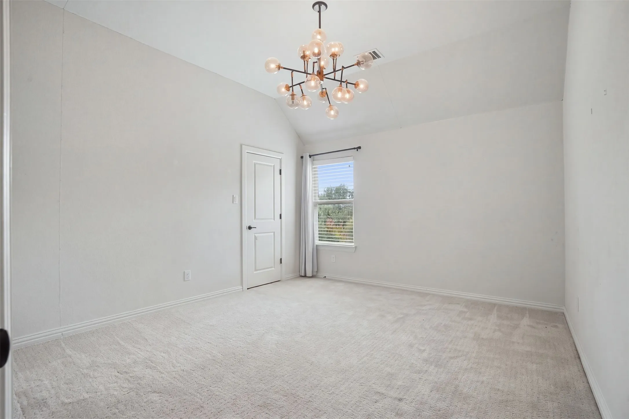 Guest bedroom with custom lighting