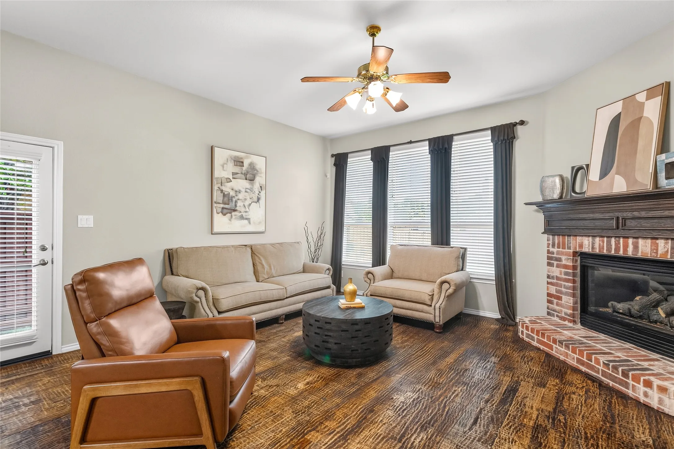 Living room with charming corner fireplace
