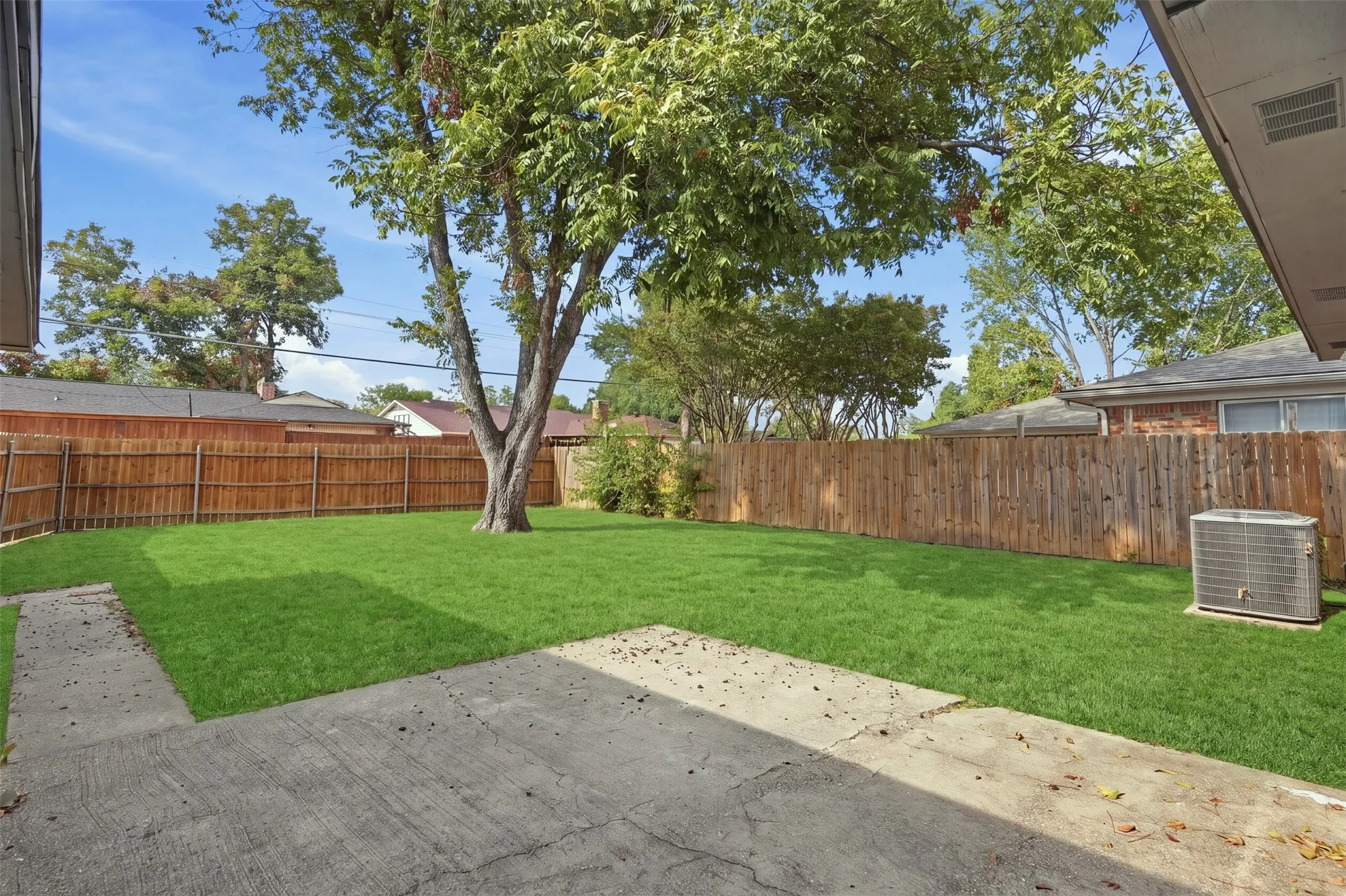 Patio area off the fenced backyard