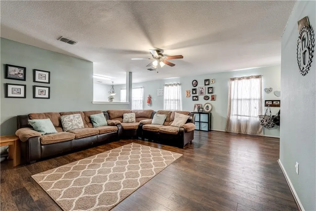 Wood-finish flooring throughout the living space