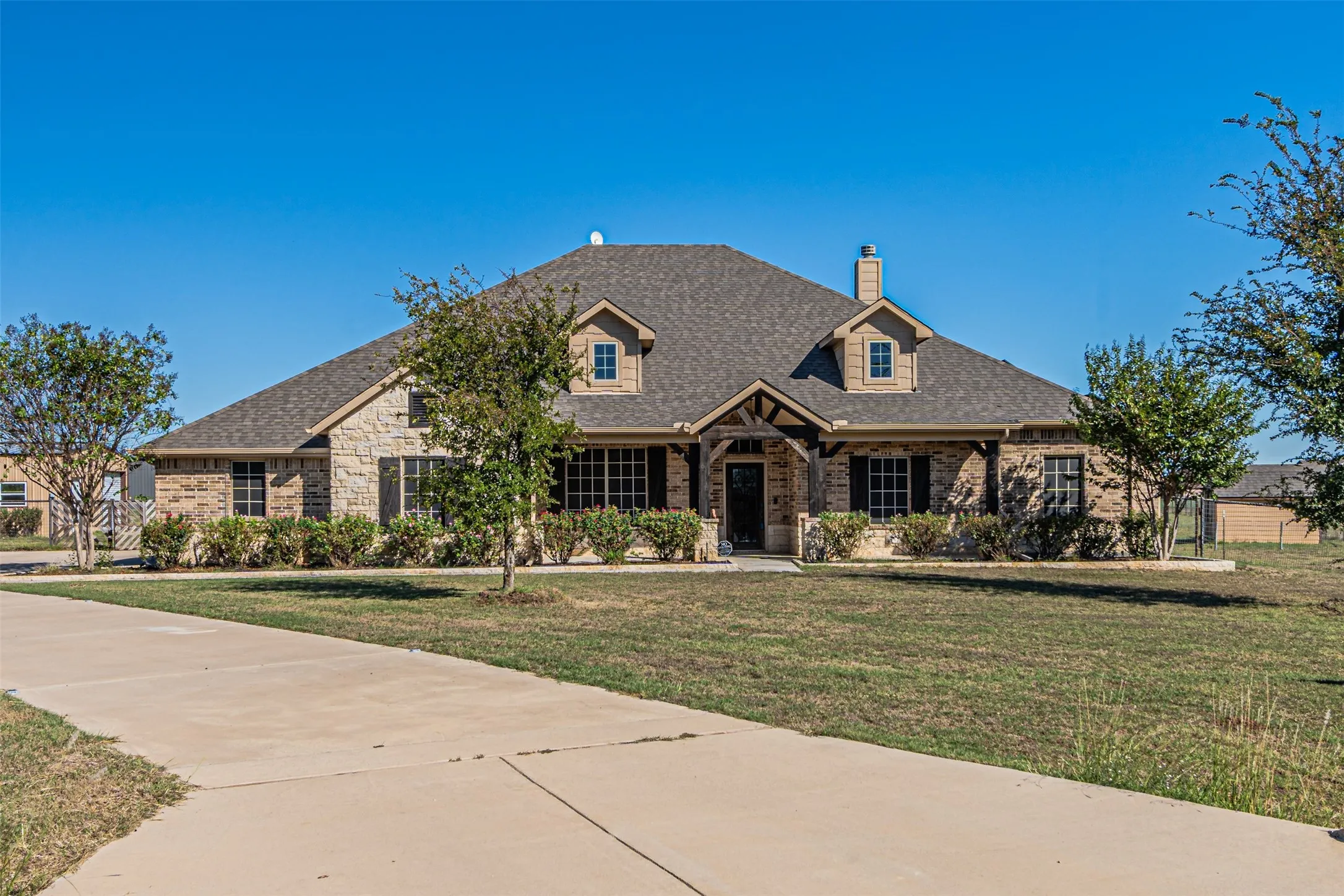 Stone and brick exterior with a gabled roof