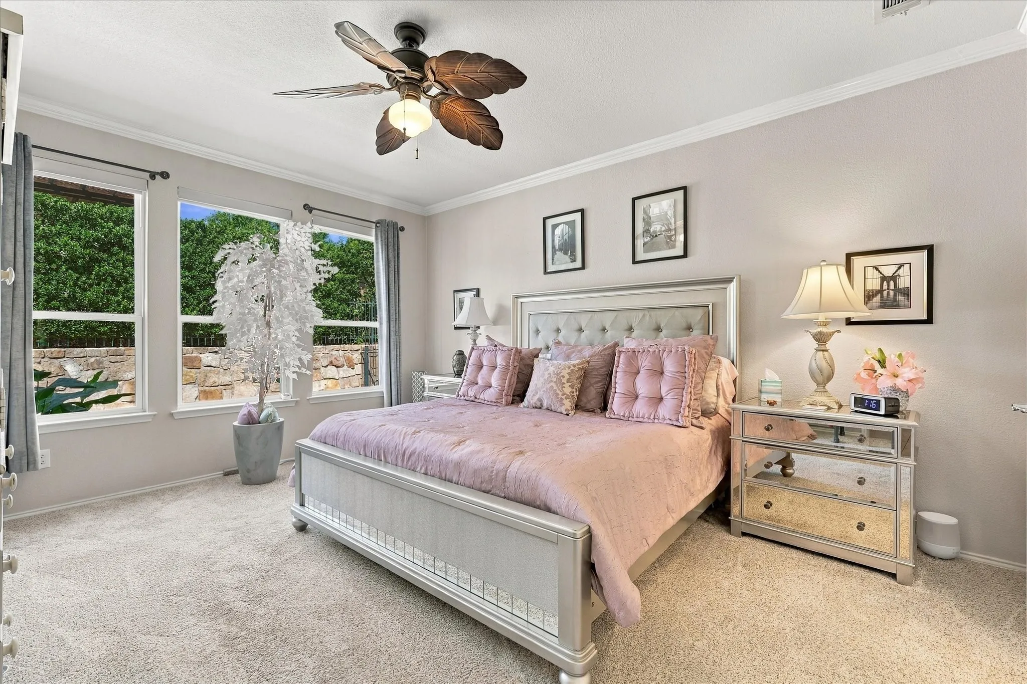 Primary Bedroom with view of backyard