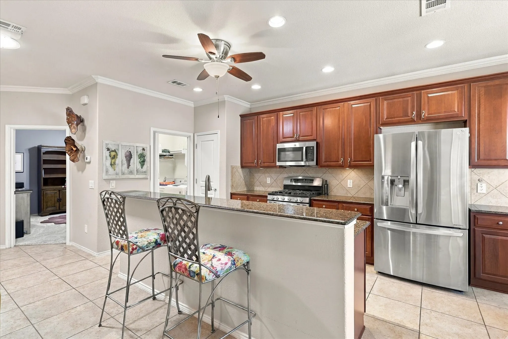 Kitchen opens to Utility Room and Office