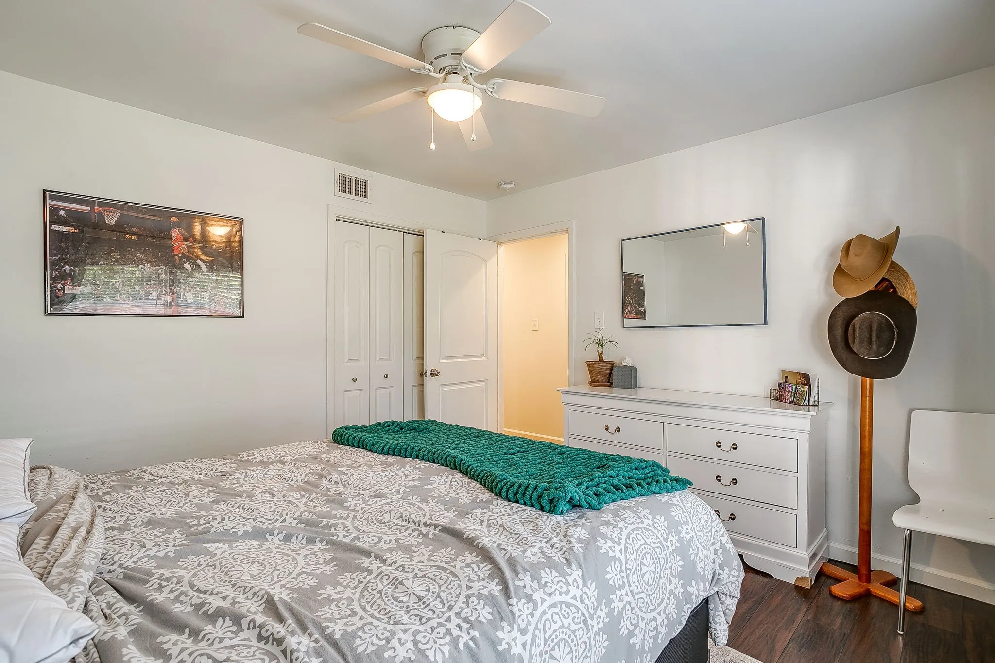 White walls with wood-finish flooring