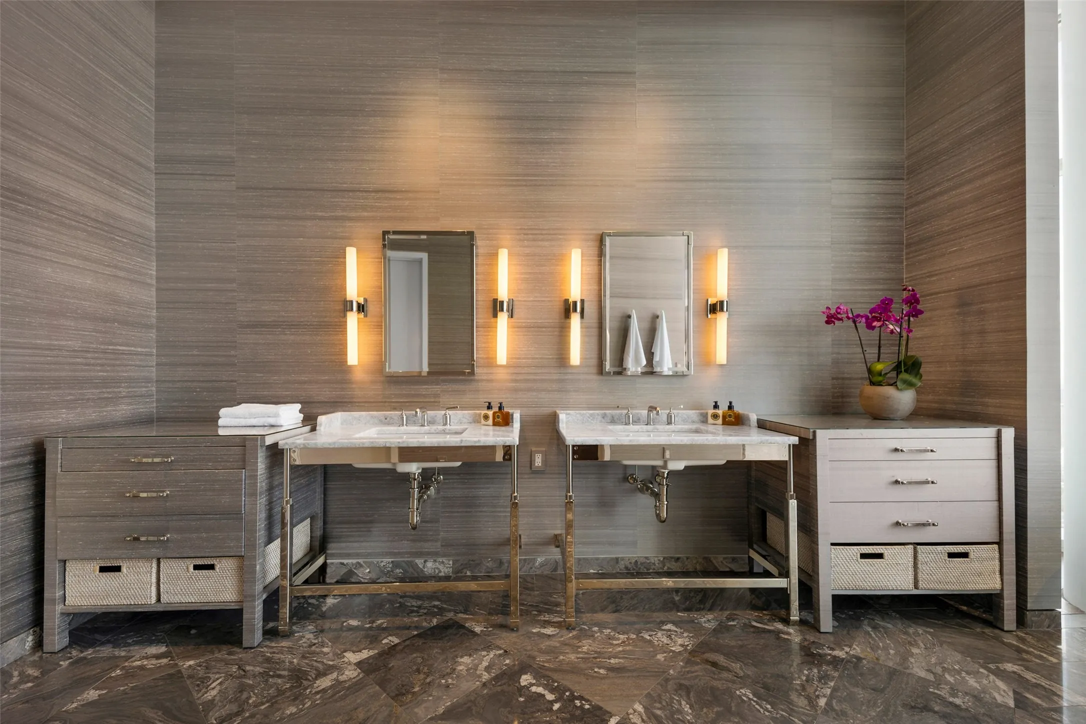 Calcite surfaces/silk wrapped cabinetry