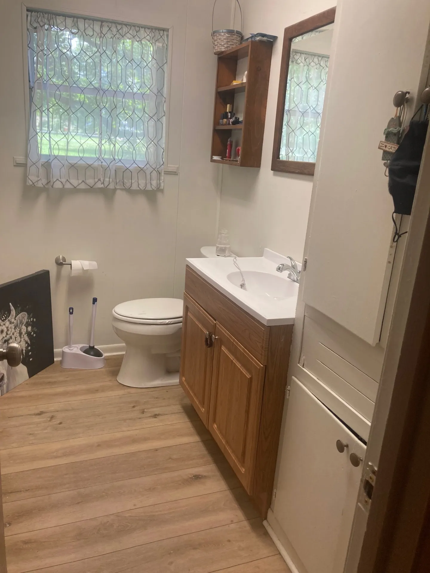 Wood-finish flooring with white walls
