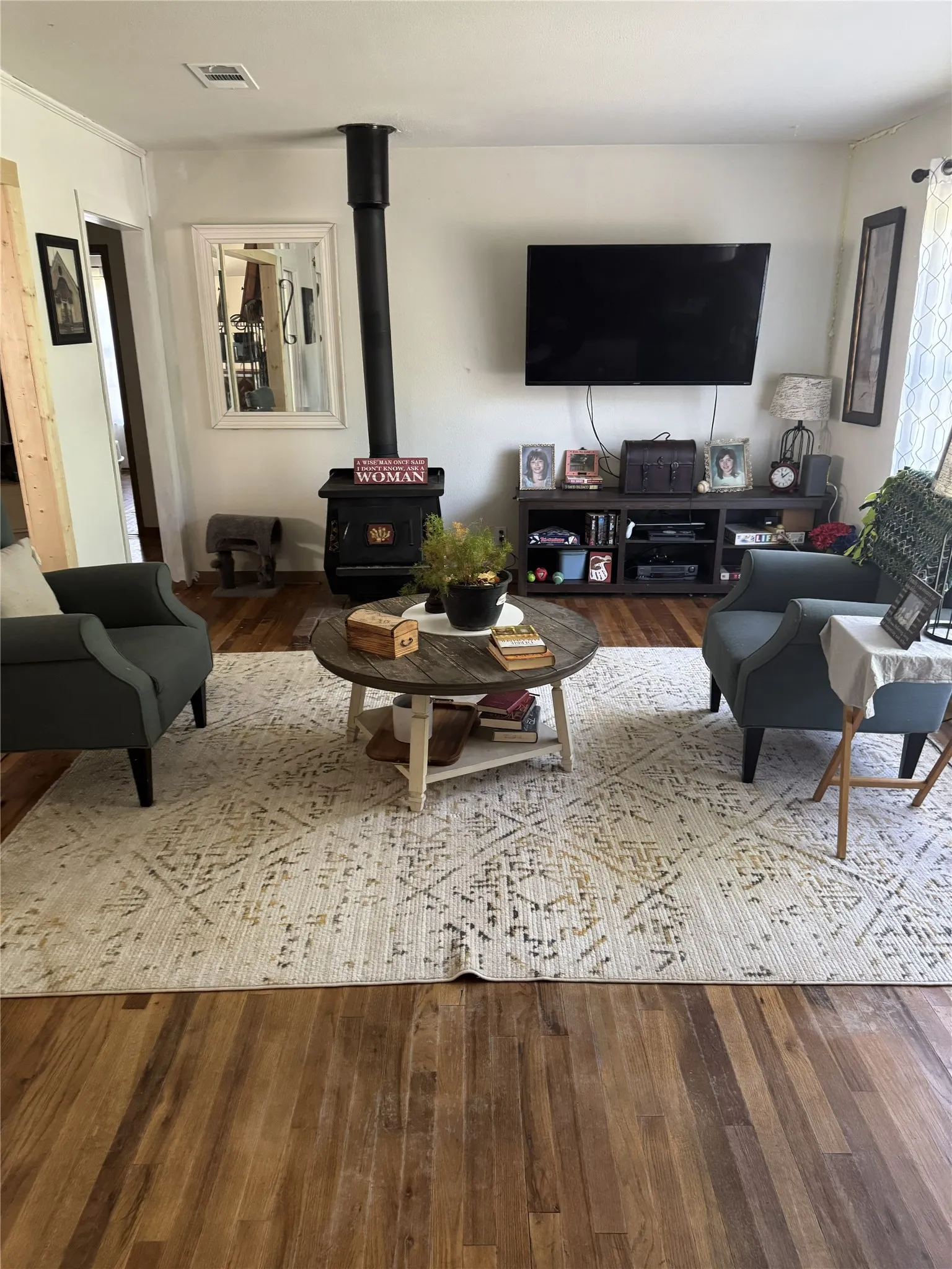 Wood-finish flooring throughout the living space