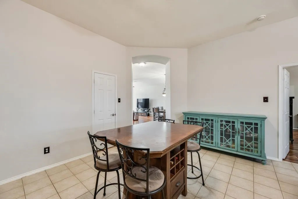 Tiled flooring with a vaulted ceiling
