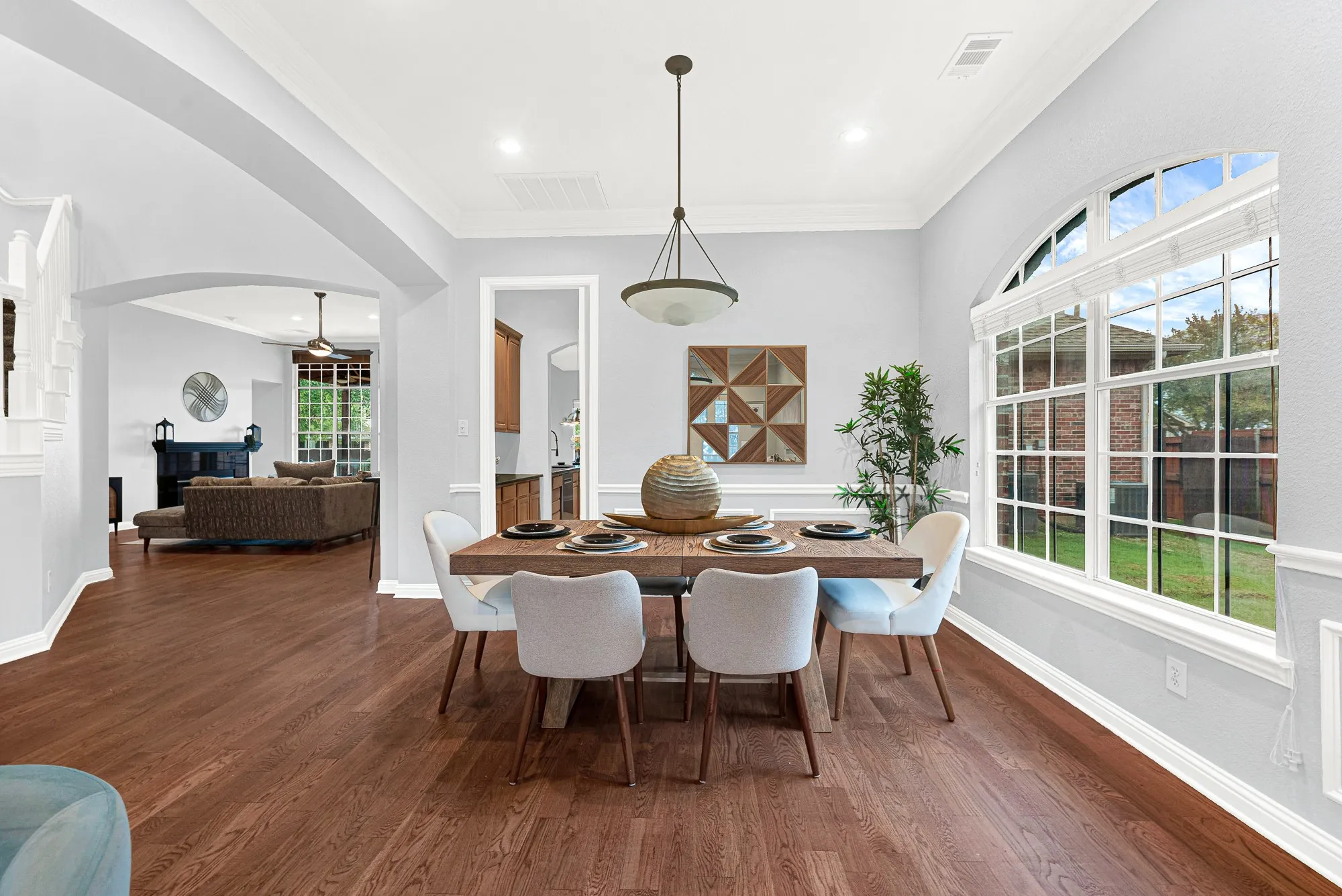 Formal dining room is open to the primary living spaces