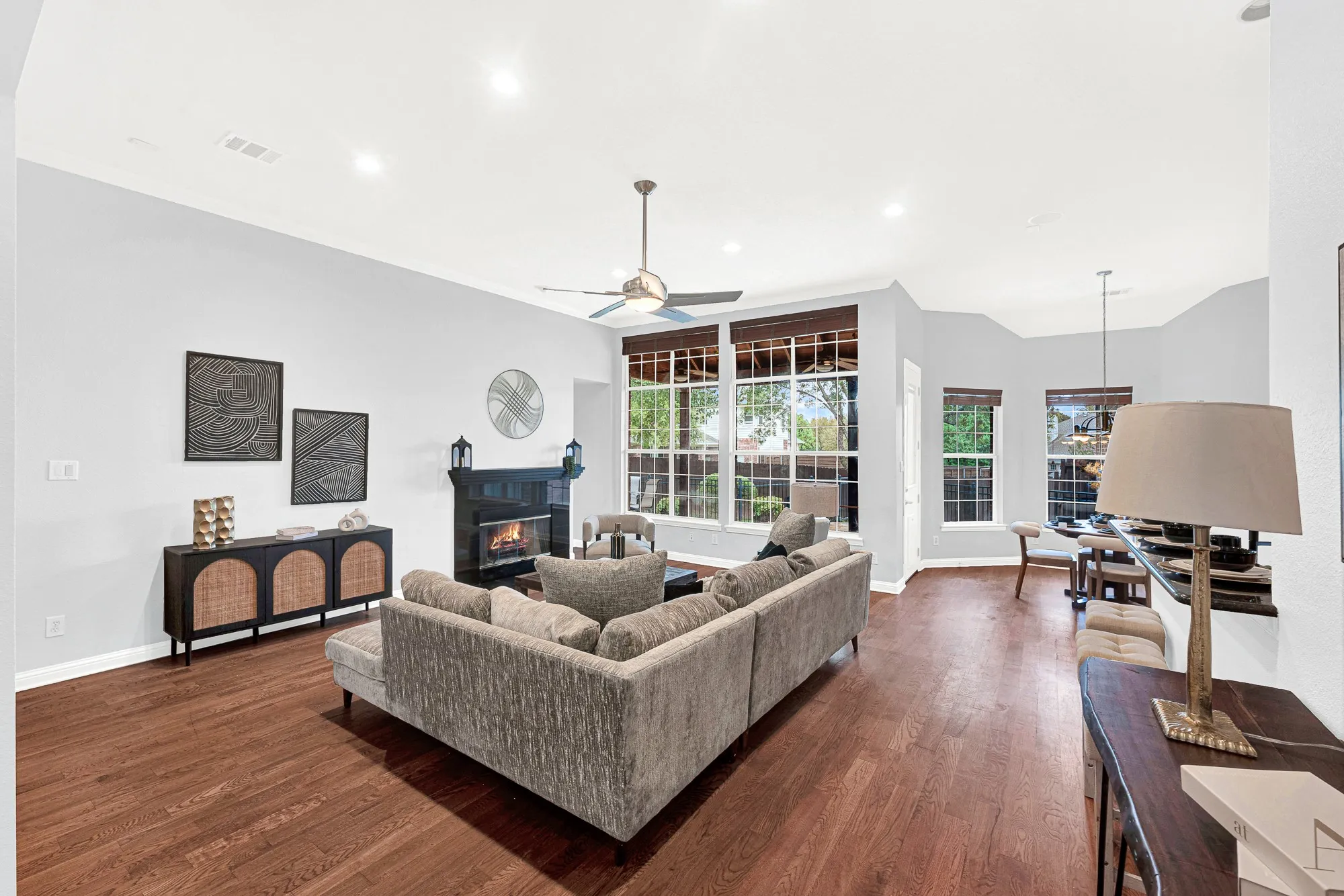 Spacious family room affords great views of the pretty backyard