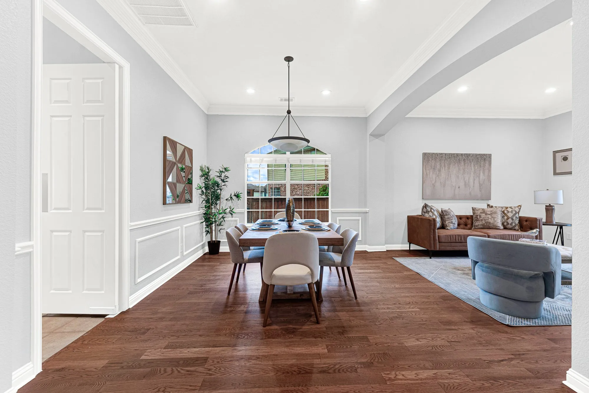 Kitchen connects to the formal dining and living areas