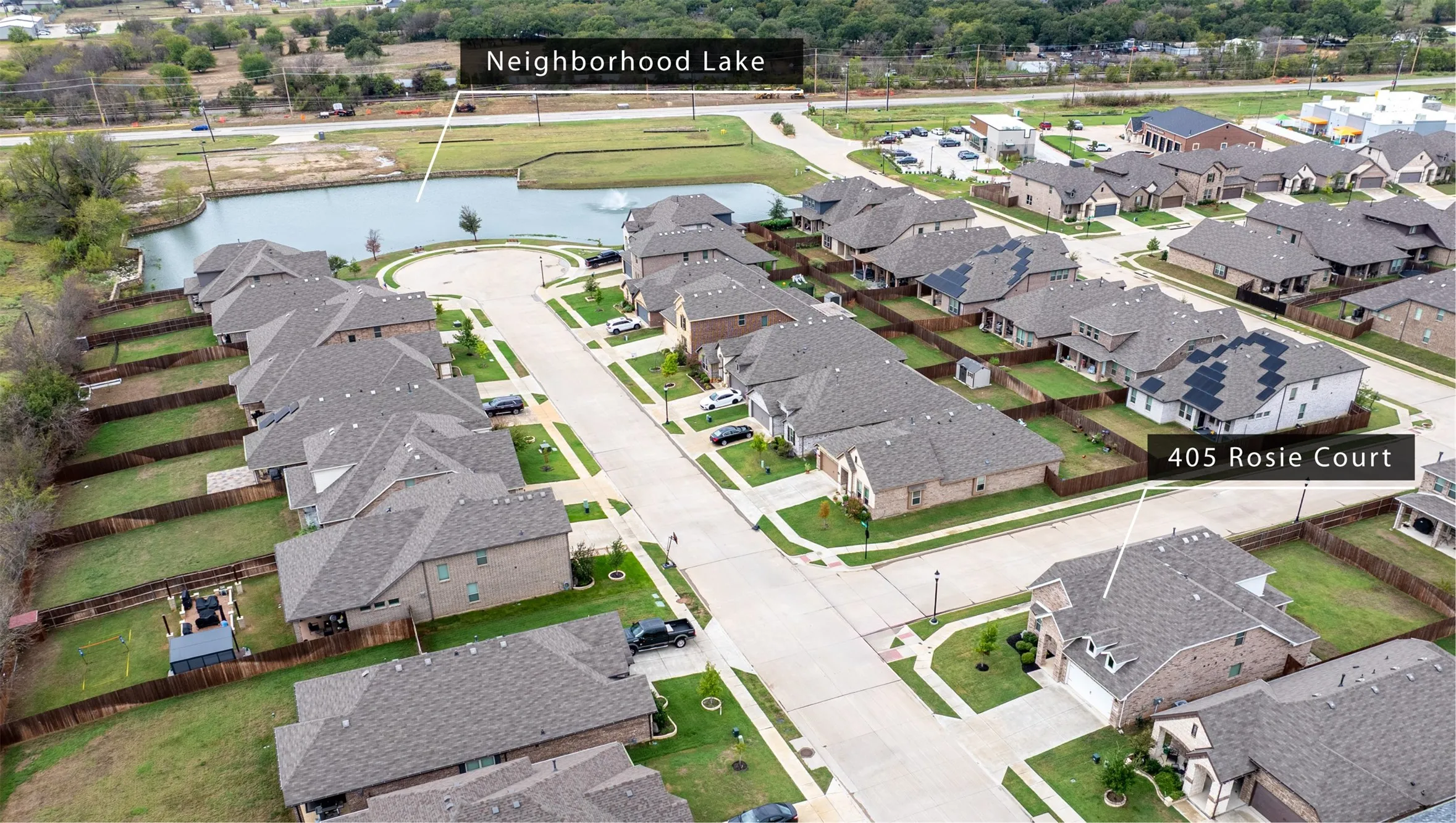 Aerial neighborhood view showcasing the established community, surrounding homes, spacious streets, and desirable Argyle ISD location.