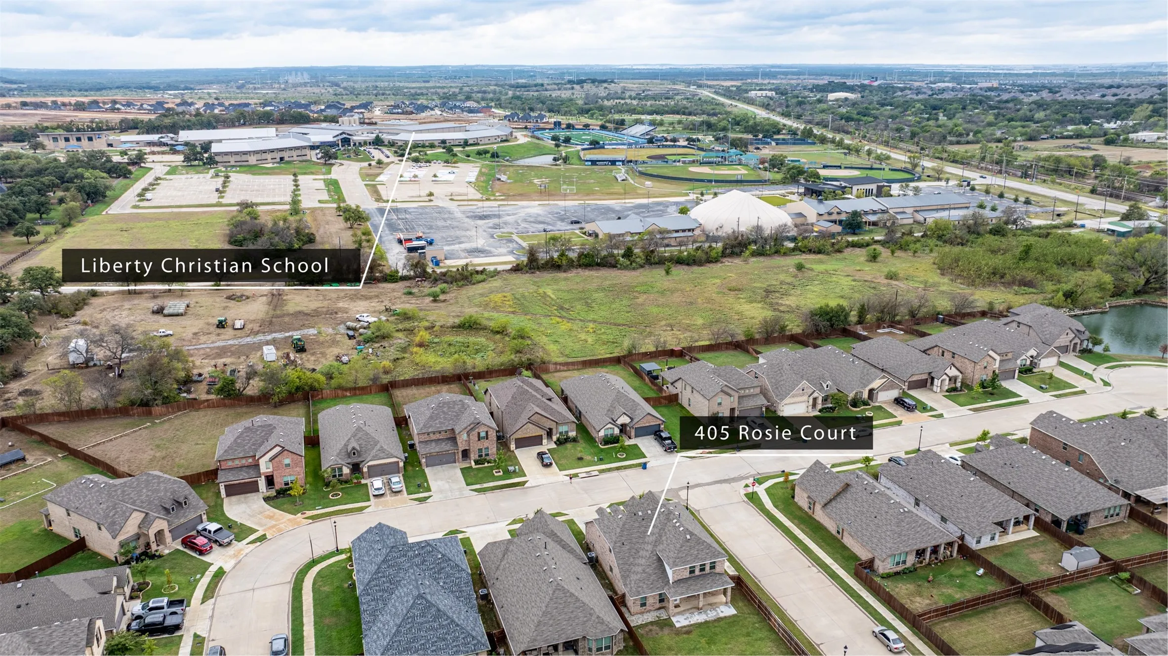 Aerial view showcasing the home’s convenient proximity to Liberty Christian Academy and Argyle ISD, offering families flexible private and public school options for their children’s education.