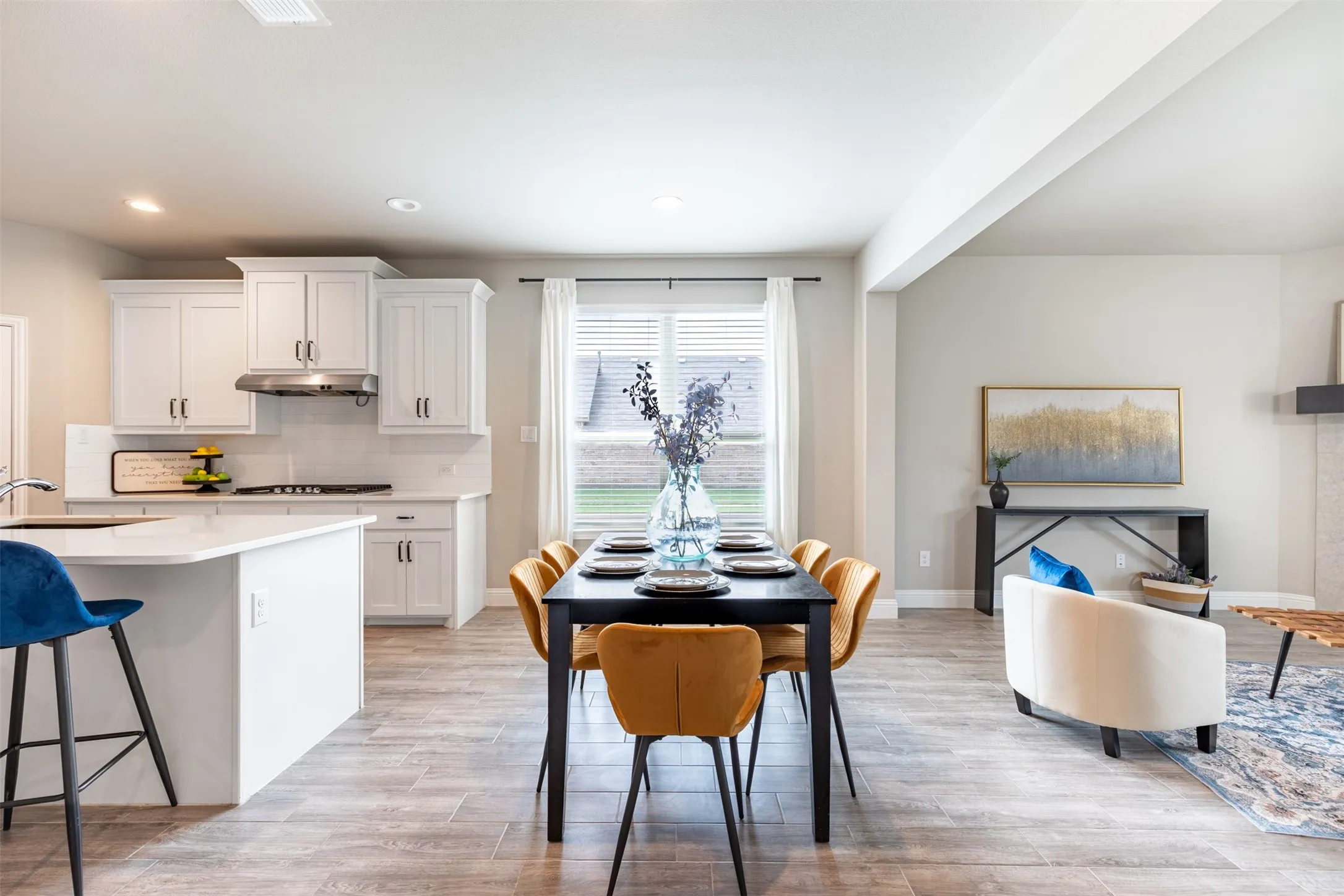 Spacious eat-in kitchen with ample room for a large dining table, creating an inviting gathering space for family meals and entertaining.
