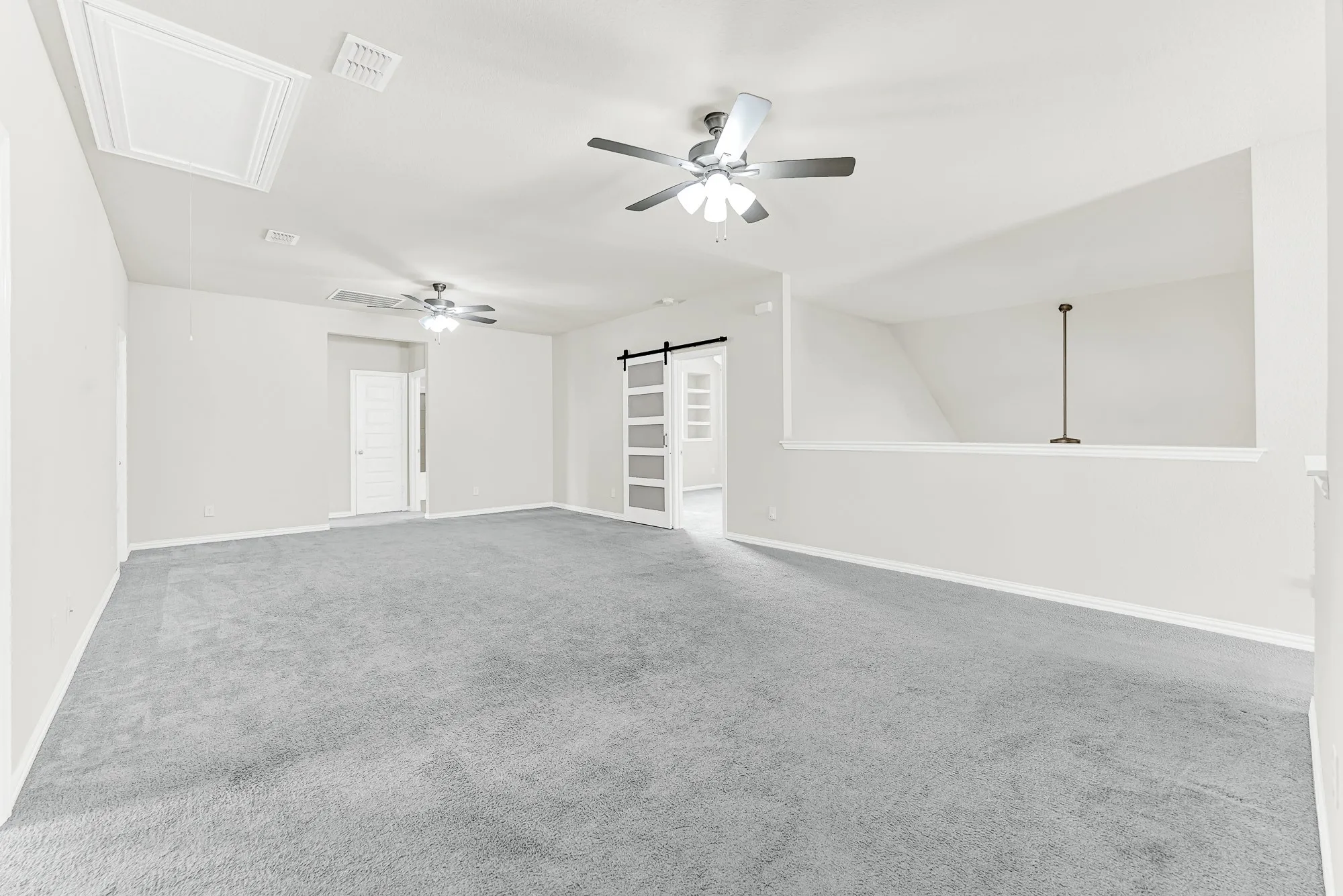 A open half-wall overlook connects the upper flex space directly to the main living area below. Imagine catching up on your favorite TV shows or gaming sessions while staying connected to the gentle hum of the house.