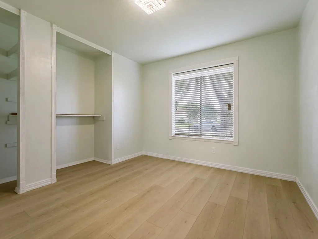 Hardwood-style flooring throughout