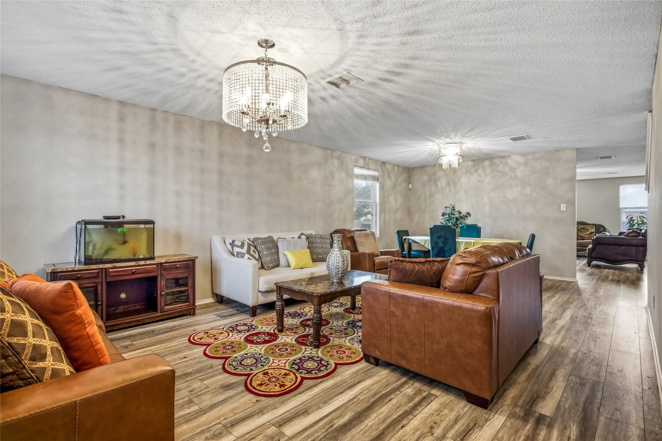 Living room and dining room as you enter the home.
