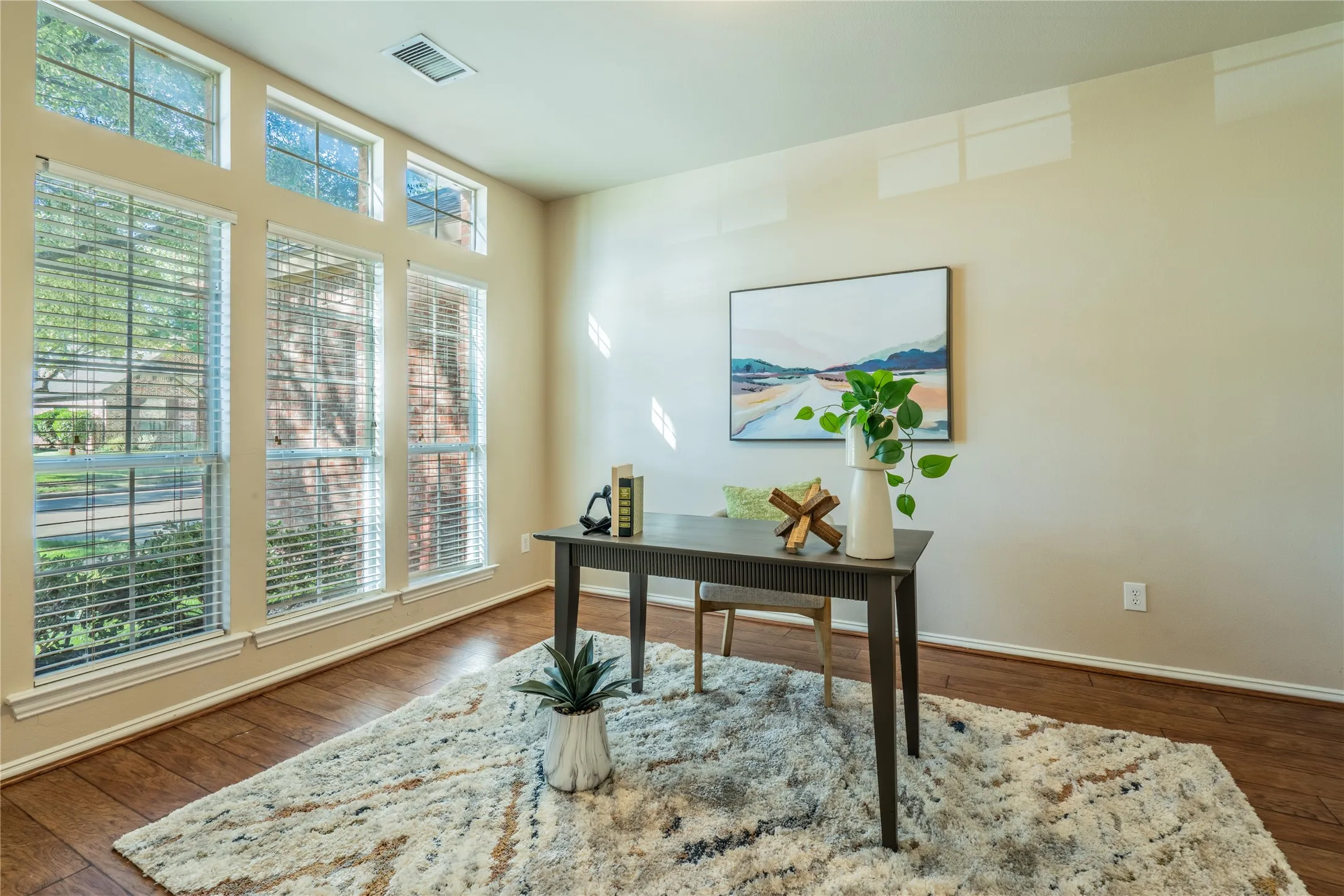 Wood-finish flooring with a neutral wall color