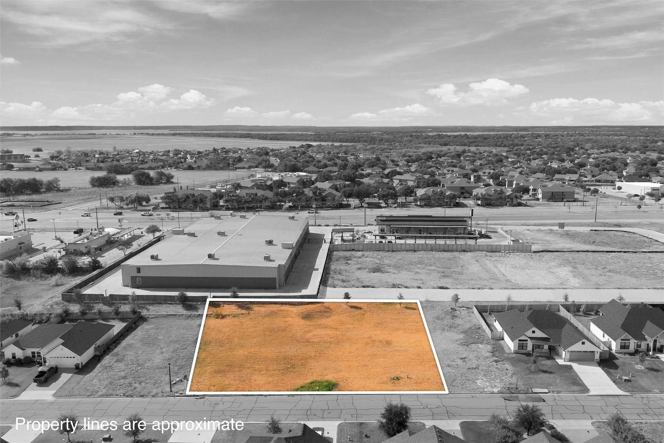 Expansive cleared lot with defined boundaries