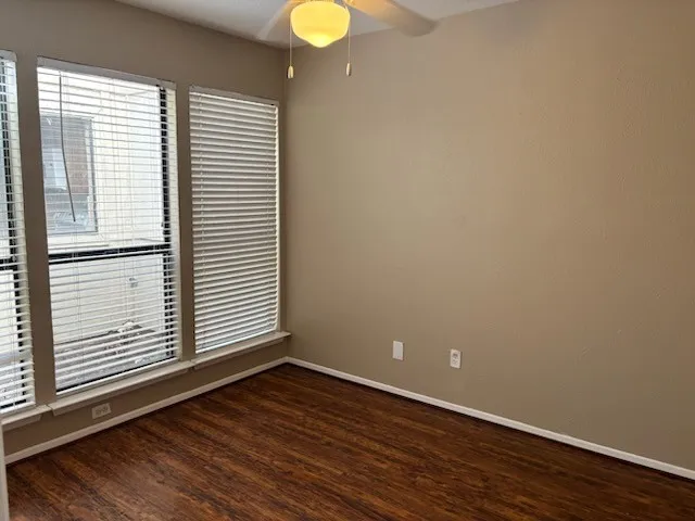 Bedroom #3 with 3 large windows overlooking the open garden