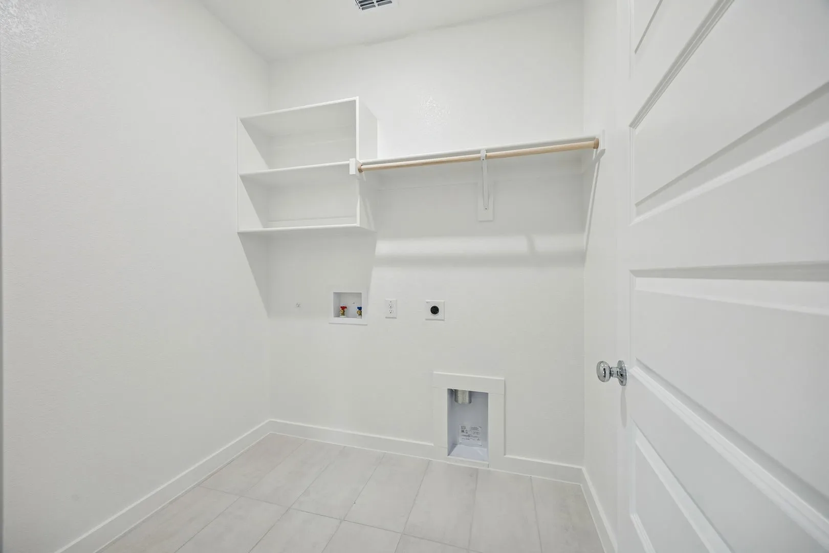 Utility Room in the Stanley II home plan – REPRESENTATIVE PHOTO