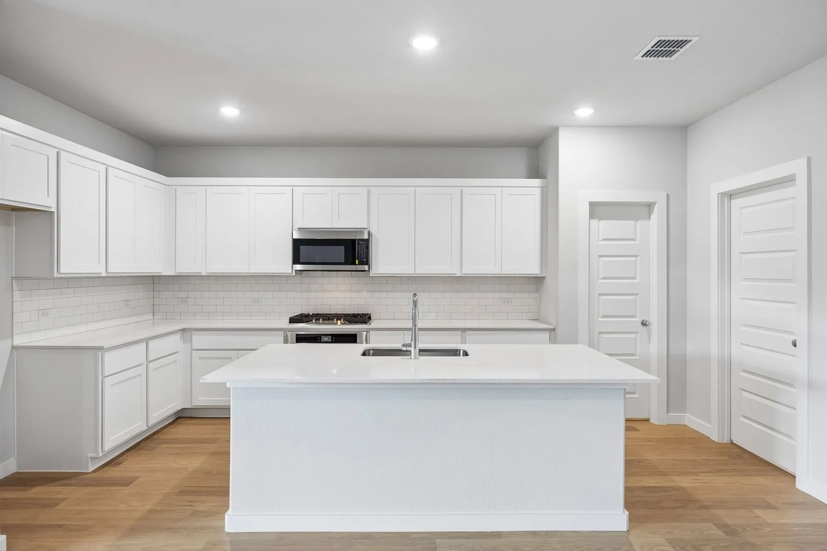 Kitchen in the Oscar home plan – REPRESENTATIVE PHOTO