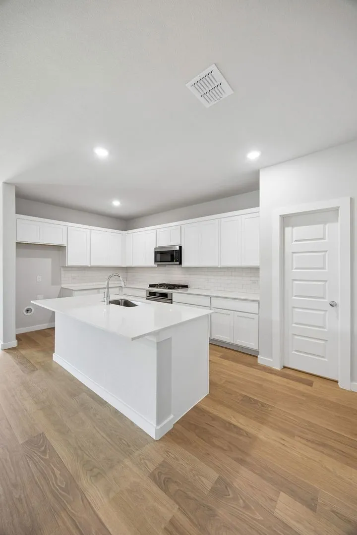 Kitchen in the Oscar home plan – REPRESENTATIVE PHOTO