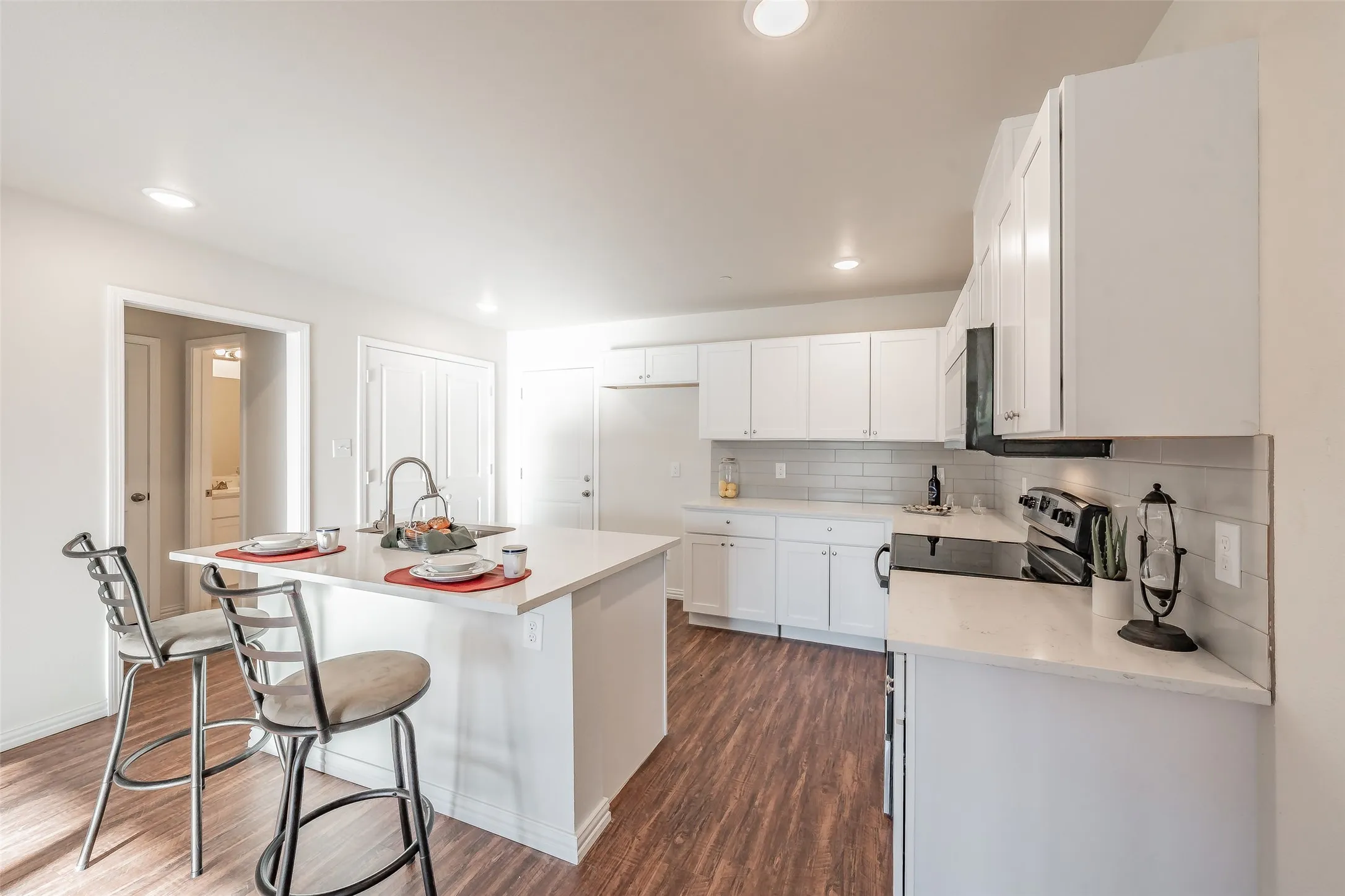 Spacious kitchen with half bathroom just to the left
