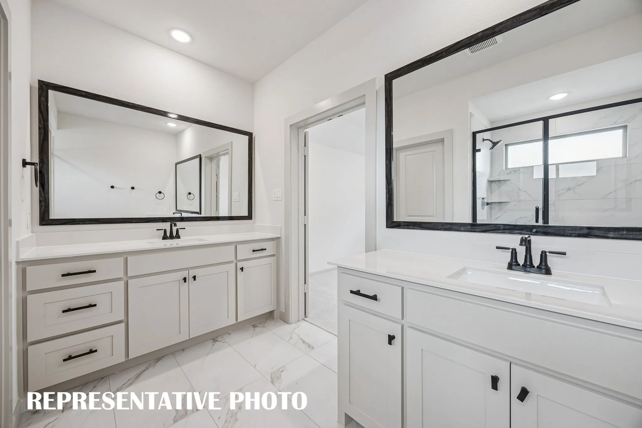 Plenty of space for two in this beautiful owner's bath.  REPRESENTATIVE PHOTO